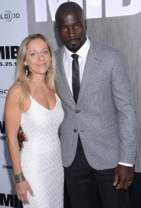 Iva Colter posing with her husband on a event