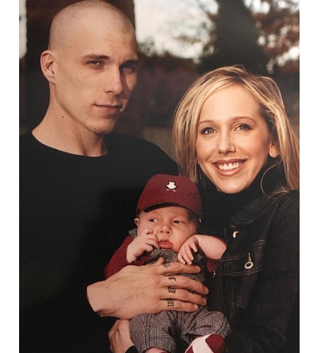 Denika Kisty with her husband, Jason, and her child