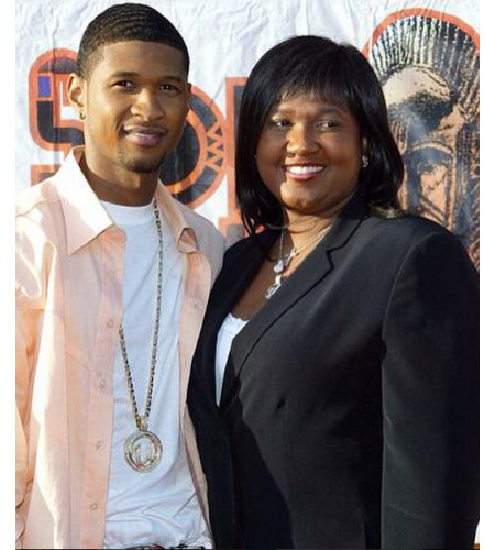 Jonette with her son, Usher during an event