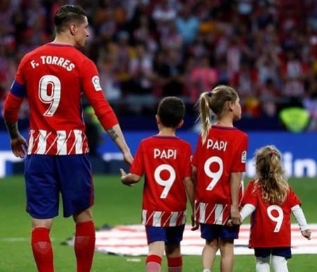 Fernando Torres and his three kids